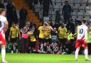 Chaos after Will Longbottom equalised for Guiseley at Stevenage in the FA Cup. Picture: TGS PHOTO