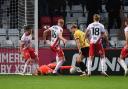 Murphy Cooper makes a superb stop to deny Will Longbottom of Guiseley in the FA Cup. Picture: TGS PHOTO