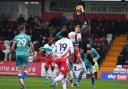 Reading goalkeeper Joel Pereira pinches a ball away from Carl Piergianni. Picture: TGS PHOTO