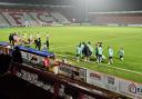 Tired bodies at half-time in extra-time between Stevenage and Cheltenham.