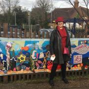 Gilly Chegwyn and Glenda Dixon show off their seascape outside Letchworth train station