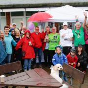 Carers brave summer showers to complete Carers Week fundraising walk