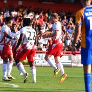 Elliott List and Stevenage celebrate their winner against Shrewsbury Town. Picture: TGS PHOTO