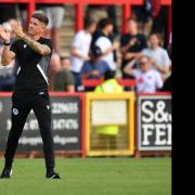 There will always be comparisons with Steve Evans but Alex Revell is also his own man. Picture: TGS PHOTO