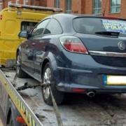 Police seized a car in Hitchin after arresting the driver on suspicion of shoplifting and driving without insurance.