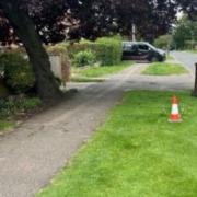 The cone marks the proposed site for the phone mast in Cashio Lane.