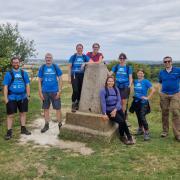 Some of the team on Trig Pillar at Deacon Hill, Pegsdon, as part of a recent training walk