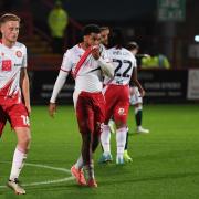 Stevenage's Harvey White and Jamie Reid walk off the pitch after the defeat at home to Bolton. Picture: TGS PHOTO