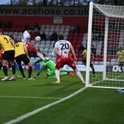 Jamie Reid puts Stevenage into the lead against Guiseley in the FA Cup. Picture: TGS PHOTO