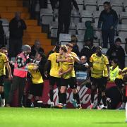 Chaos after Will Longbottom equalised for Guiseley at Stevenage in the FA Cup. Picture: TGS PHOTO