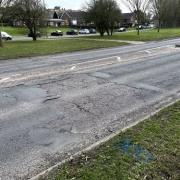 The road surface on the A505 at Letchworth Gate has become worn.