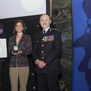 Hertfordshire Chief Constable Charlie Hall, Isla Rasit, and the chair of the National Police Chiefs' Council Chief Constable Gavin Stephens.